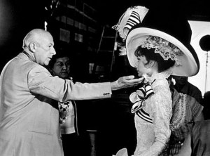1964-production-designer-cecil-beaton-checks-audrey-hepburns-costume-on-the-set-of-my-fair-lady-19641